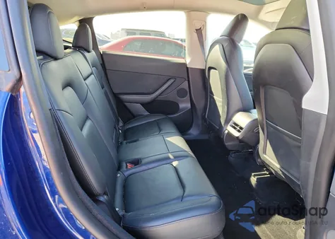 2022 Tesla Model Y из США, поврежденный, VIN 7SAYGDEE7NA021950